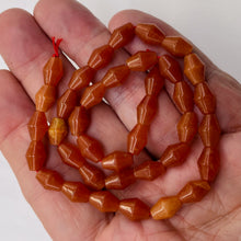 Load image into Gallery viewer, Designer Red Aventurine Artcut 10x7mm Bead Strand 102896