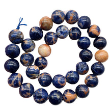 Load image into Gallery viewer, Blue Sodalite with White and Orange 12mm Round Bead Strand 110781