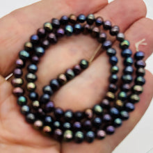 Load image into Gallery viewer, Near Round Blue Peacock 6-5mm FW Pearl Strand 109941