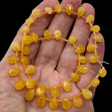Load image into Gallery viewer, Sunset Rare Honey Jade Faceted Briolette 10x7x5mm Bead Strand 104537