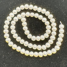 Load image into Gallery viewer, AAA Natural Wedding White Round 6.5-6mm FW Pearl Strand 104499