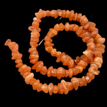 Load image into Gallery viewer, Chalcedony Chip Strand | 7x7x2 to 12x7x4mm | Orange Pink | 100 to 120 Bead(s)