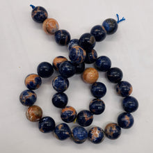 Load image into Gallery viewer, Blue Sodalite with White and Orange 12mm Round Bead Strand 110781