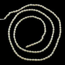 Load image into Gallery viewer, Creamy 2-2.5x1.5mm Seed Pearl Strand 103448