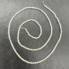 Load image into Gallery viewer, Creamy 2-2.5x1.5mm Seed Pearl Strand 103448