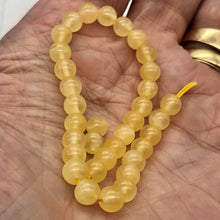 Load image into Gallery viewer, Calcite Round Bead Strand | 6mm | Yellow | 65 Bead(s) |