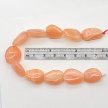 Load image into Gallery viewer, Chalcedony Oval Carved Stone | 18x13x7 to 15x12x7 | Orange Pink | 12 Bead(s)