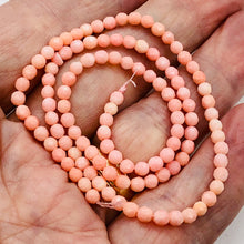 Load image into Gallery viewer, Coral Faceted Strand Round | 3 mm | Salmon | 112 Beads |