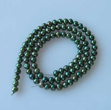 Load image into Gallery viewer, 4-5mm Forest Green Freshwater Pearl 16" Strand 109959 - PremiumBead Primary Image 1