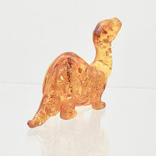 Load image into Gallery viewer, Natural Untreated Amber Hand Carved Diplodocus Dinosaur | 45x27x10mm | Figurine