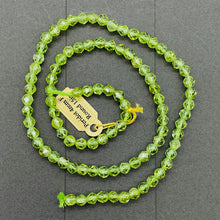 Load image into Gallery viewer, Peridot Faceted 15" Round Bead Strand | 7x4mm | Green | 93 Beads |