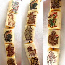 Load image into Gallery viewer, Rare Scrimshaw Chinese Zodiac Waterbuffalo 12 Bone Bead Set 104841B - PremiumBead Primary Image 1