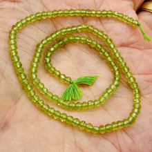 Load image into Gallery viewer, Peridot Faceted Roundel 13" Bead Strand | 4 mm | Green | 130 Beads | 13" |