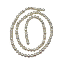 Load image into Gallery viewer, Premium White Freshwater Pearl Strand | 4.5x4.5-4.5x4mm | 100 Pearls }