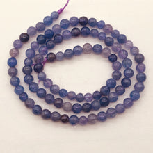 Load image into Gallery viewer, Tanzanite Gemmy Round 16&quot; Strand | 5 mm | Lavender | 80 Beads |

