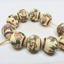 Load image into Gallery viewer, Scrimshawed Phoenix and Lotus Waterbuffalo Bone 20mm Round Bead 10735 | 20mm | Cream, Green, Red, Brown - PremiumBead Alternate Image 3