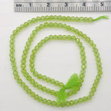 Load image into Gallery viewer, Peridot Faceted Roundel 13" Bead Strand | 4 mm | Green | 130 Beads | 13" |