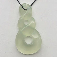 Load image into Gallery viewer, Hand Carved Translucent Serpentine Infinity Pendant with Black Cord 10821W | 45.5x24x6mm | Light Green - PremiumBead Primary Image 1