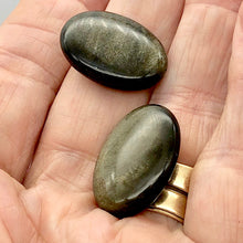 Load image into Gallery viewer, Gold Sheen Obsidian Oval | 25x17x7mm | Golden black | 2 Bead(s) |