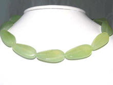 Load image into Gallery viewer, Twisted Gemmy Serpentine Oval Bead Strand 108683 - PremiumBead Primary Image 1