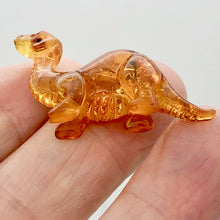 Load image into Gallery viewer, Natural Untreated Amber Hand Carved Diplodocus Dinosaur | 45x27x10mm | Figurine