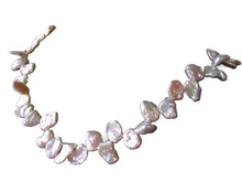 Load image into Gallery viewer, Rose Petal 12x9x4mm to 16.5x10x3.5mm Creamy White Keishi FW Pearl Strand 109945C