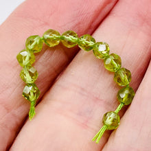 Load image into Gallery viewer, Peridot Faceted Parcel Round Beads | 7x4mm | Green | 12 Beads |