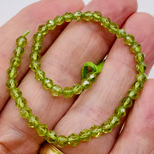 Load image into Gallery viewer, Peridot Faceted 15" Round Bead Strand | 7x4mm | Green | 93 Beads |