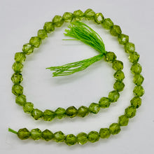 Load image into Gallery viewer, Peridot Faceted Half-Strand Round Beads | 7x4mm | Green | 47 Beads |