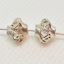 Load image into Gallery viewer, Designer 4 Silver Twisted Roundel 7.5mm Beads 7858 - PremiumBead Alternate Image 3