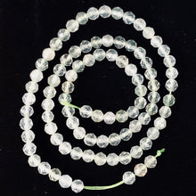Load image into Gallery viewer, Prehnite Faceted Strand Round | 4 mm | Light Green | 80-90 Beads |