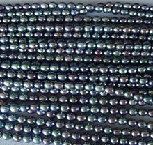 Load image into Gallery viewer, Perfect Peacock Oval FW Pearls | 6.5x5.5-6x5mm | Peacock | Oval | 20 pearls | - PremiumBead Alternate Image 6