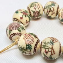 Load image into Gallery viewer, Scrimshawed Phoenix and Lotus Waterbuffalo Bone 20mm Round Bead 10735 | 20mm | Cream, Green, Red, Brown - PremiumBead Alternate Image 2
