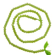 Load image into Gallery viewer, Peridot Faceted Roundel 13" Bead Strand | 4 mm | Green | 130 Beads | 13" |