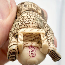 Load image into Gallery viewer, Scrimshaw carved Sleeping Asian Boy with Drum figurine - PremiumBead Alternate Image 6