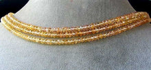 Load image into Gallery viewer, Natural 3.75x2.5mm Imperial Topaz Faceted Roundel Bead 54cts. Strand 106187 - PremiumBead Alternate Image 2
