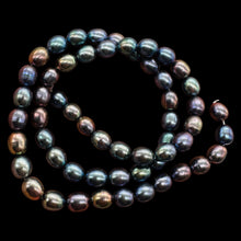 Load image into Gallery viewer, Blue Pink Lavender Freshwater Pearl Strand | Near-Round Oval | 7x6mm| 55 Pearls
