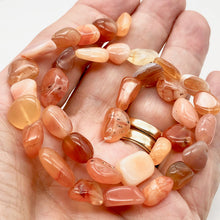 Load image into Gallery viewer, Botswana Nugget Bead Half-Strand | 9x7x6mm to 15x8x4mm | Orange | ~16 Bds |
