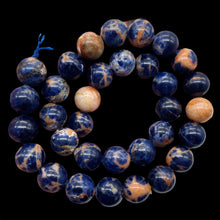 Load image into Gallery viewer, Blue Sodalite with White and Orange 12mm Round Bead 8 inch Strand 10781HS
