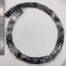 Load image into Gallery viewer, Tourmalinated Double Drilled Quartz 16&quot; Strand | 23x15x7mm| Clear, Black| 20 Bds
