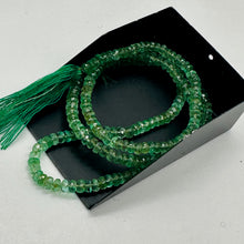 Load image into Gallery viewer, Brazilian Emerald Faceted Rondelle Beads 32 Ct Green 230 Bead Strand
