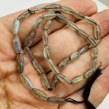 Load image into Gallery viewer, Natural Blue Flash Labradorite Flat Oval Bead Strand 16" 49 Beads Canada
