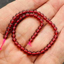 Load image into Gallery viewer, Champagne Garnet AAA Round Beads Half Strand | 4mm | Red | 50 Beads |
