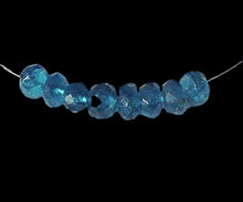 Load image into Gallery viewer, Stunning AAA Neon Blue Apatite Faceted Roundel Bead Strand | 4x2mm | 150 Beads |

