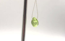 Load and play video in Gallery viewer, Peridot Faceted Briolette Bead | .9 cts | 7x5x3mm | Green | 1 bead |
