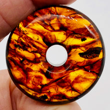 Load image into Gallery viewer, Amber 7mm Center Hole Donut Pendant Bead | 2 1/4x7/8&quot; | Red | 1 each |
