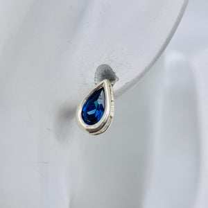 December 11x7mm Created Blue Topaz Sterling Silver Stud Earrings 10154G