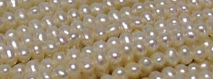 Creamy 3x2.5 to 3.5x3mm Seed Pearl Strand 102278 - PremiumBead Alternate Image 2