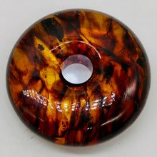 Load image into Gallery viewer, Amber 7mm Center Hole Donut Pendant Bead | 2 1/4x7/8&quot; | Red | 1 each |
