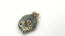 Load and play video in Gallery viewer, Waterbuffalo Bone Tropical Fish | 37x18.5x6mm | Blue/Red/Black | 1 Bead
